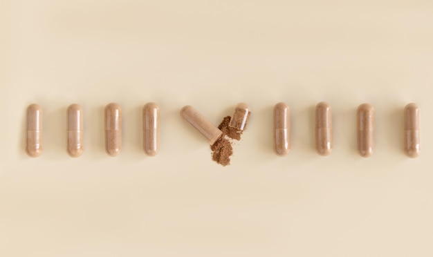 A close-up shot of various probiotic supplements in capsule form, arranged on a light-colored surface. Focus is on the labels, highlighting different strains and CFU counts.