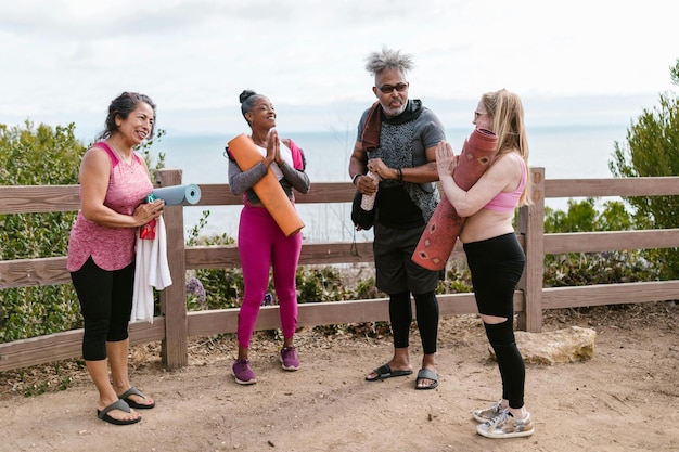 A diverse group of people engaging in various activities associated with healthy aging, such as yoga, hiking, and cooking nutritious meals. Bright and vibrant colors convey a sense of energy and vitality.