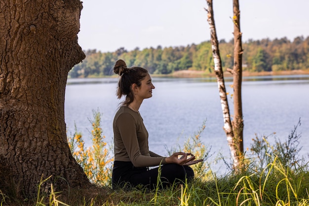 A person practicing mindfulness meditation in a serene environment, highlighting the importance of mental health in chronic pain management.