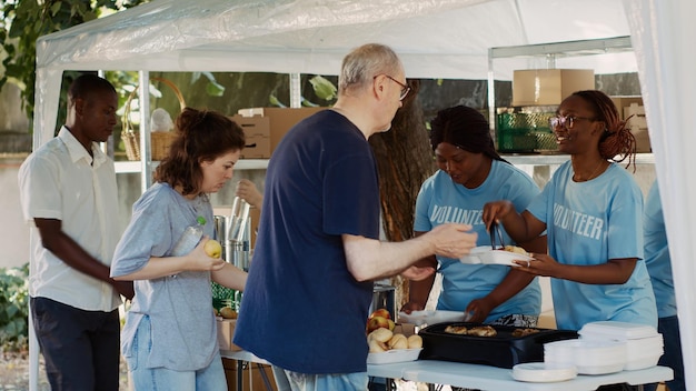 A diverse group of senior citizens participating in a health fair, with booths offering information about vaccines and preventive care. The atmosphere is lively and encouraging, promoting community health and wellness.