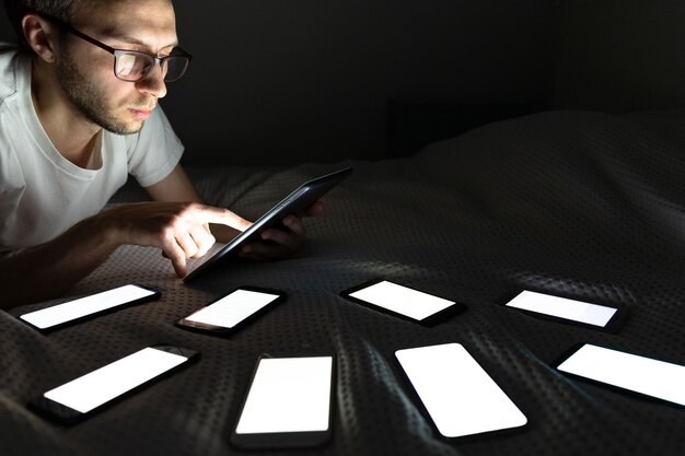 A man focusing intensely on a memory card game, illustrating attention and concentration skills