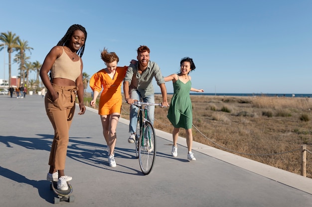 A diverse group of people participating in various physical activities outdoors, including jogging, cycling, and practicing yoga in a park. The scene is set during a sunny day, with lush green trees and a clear blue sky in the background. The focus is on promoting an active lifestyle and highlighting the importance of exercise for overall health.
