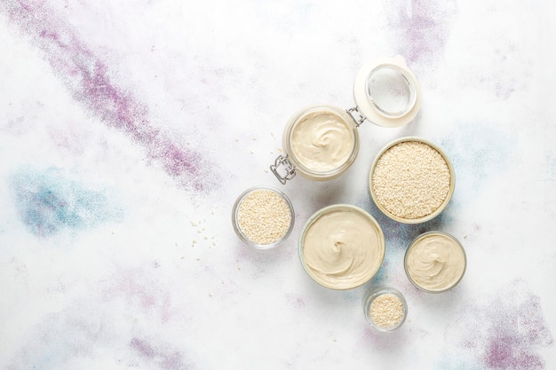 A close-up shot of different probiotic supplement forms, including capsules, powders, and yogurts, arranged to show the variety of delivery methods available to consumers for improving gut health.