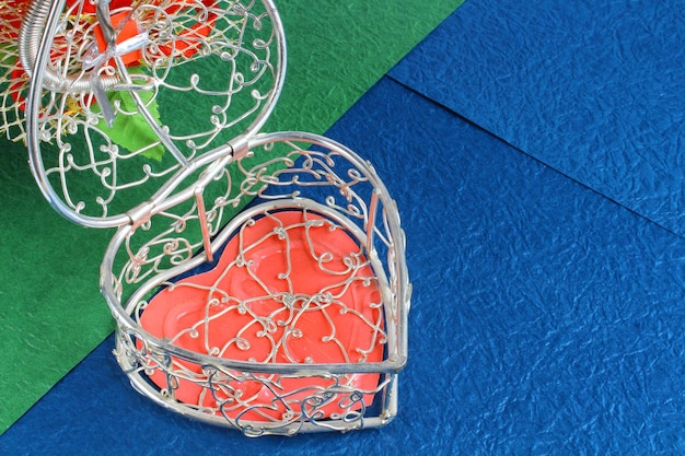A close-up of a healthy heart with a network of red and blue blood vessels clearly visible. The background is a soft, blurred image of someone walking briskly outdoors, suggesting the connection between physical activity and cardiovascular health.