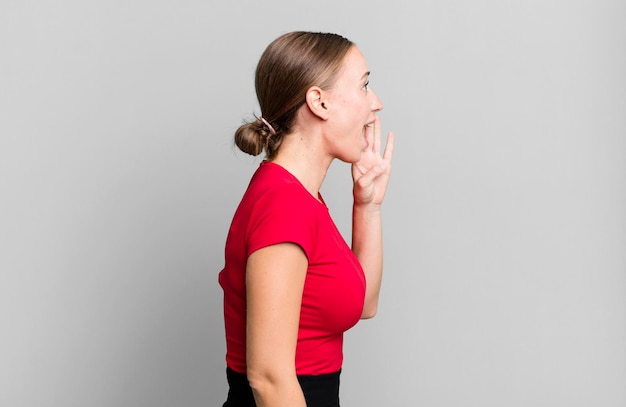 A person demonstrating a chin tuck exercise, showing the correct head and neck alignment.