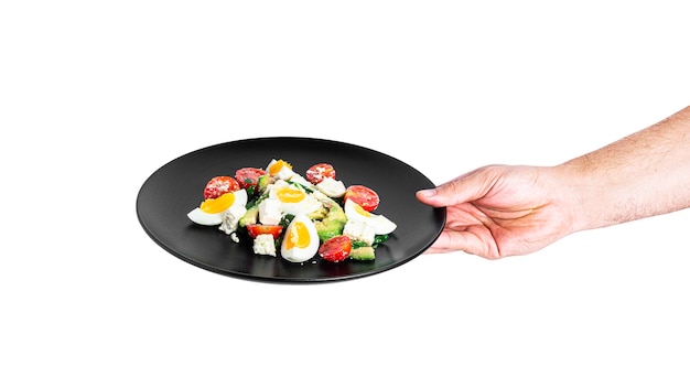 A close-up shot of a person's hands holding a plate with perfectly portioned food, including a grilled chicken breast, steamed broccoli, and brown rice, representing mindful eating and portion control.