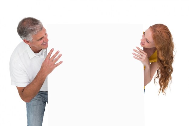 A split image showing, on one side, a person struggling to hear a conversation in a noisy restaurant environment with a thought bubble of frustration. On the other side, the same person is smiling and confidently participating in the conversation, now wearing discreet OTC hearing aids. The contrast highlights the benefits of accessible hearing solutions.