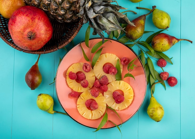 A vibrant photo of a fruit platter featuring sliced oranges, grapefruit segments, and apple wedges. The platter is surrounded by fresh mint leaves and a small bowl of honey.